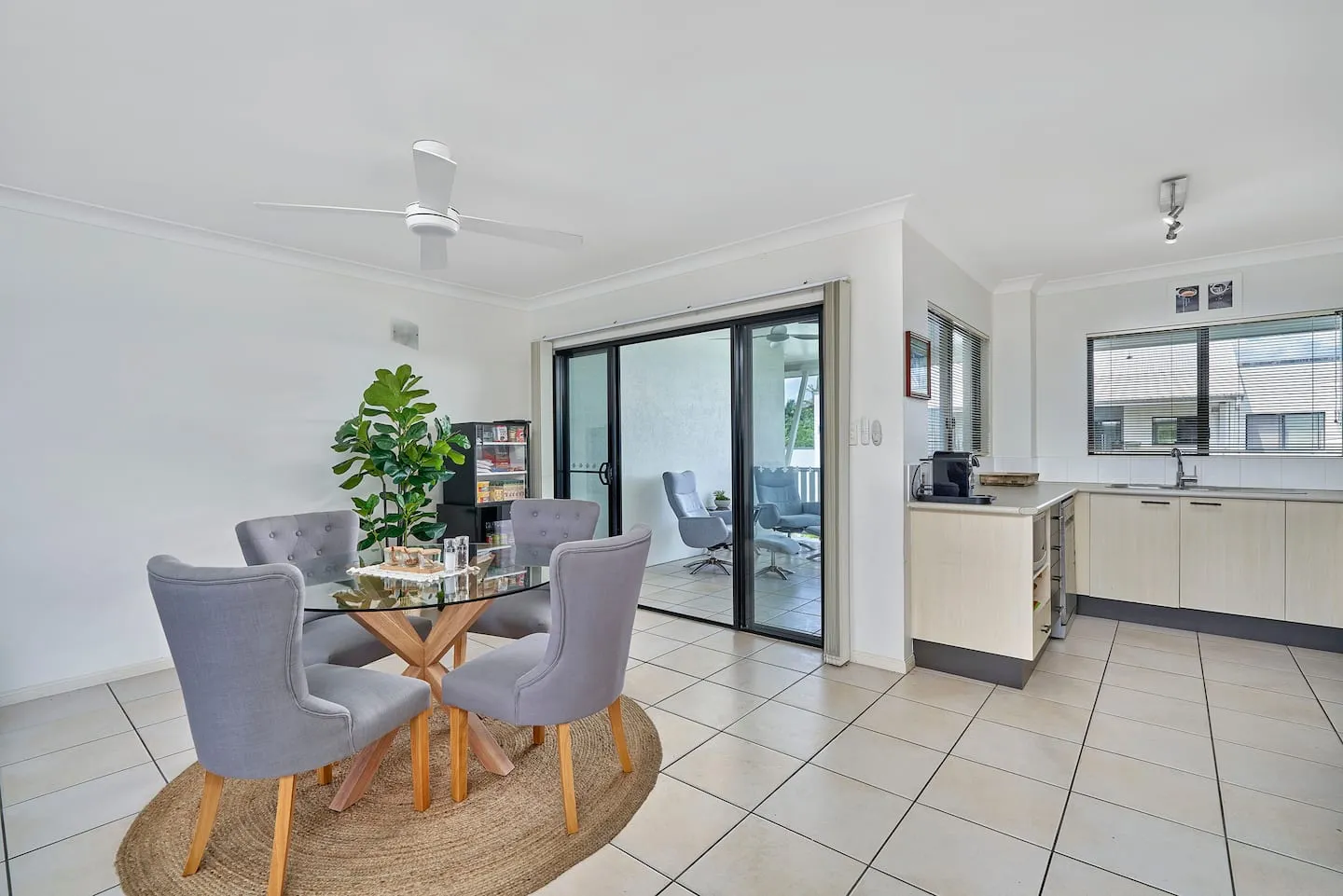Dining table and kitchen at Urban Oasis